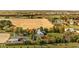 Aerial view of estate, horse barn, training area and the neighboring homes at 8552 E 550 S, Zionsville, IN 46077