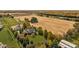 Beautiful aerial view of home, grounds, and surrounding farmland in the fall at 8552 E 550 S, Zionsville, IN 46077