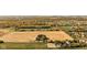 Estate with mature trees, open farmland, and houses nearby at 8552 E 550 S, Zionsville, IN 46077
