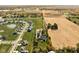 Aerial view showcasing the property's location between a residential area and farmland, offering a unique blend of privacy and community at 8552 E 550 S, Zionsville, IN 46077