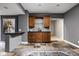 Finished basement with a bar, stone floors, and plenty of cabinet space at 8552 E 550 S, Zionsville, IN 46077
