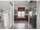 Bathroom with a built-in window seat, custom cabinetry, and a tiled floor with a seamless glass shower at 8552 E 550 S, Zionsville, IN 46077