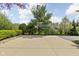 Driveway with basketball hoop, with mature trees and landscaping at 8552 E 550 S, Zionsville, IN 46077