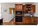 Charming kitchen featuring custom cabinets, granite countertops, and modern appliances including microwave and oven at 8552 E 550 S, Zionsville, IN 46077