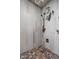 Modern shower with decorative tile, a built-in niche, and multiple shower heads and adjustable settings at 8552 E 550 S, Zionsville, IN 46077