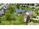 Aerial view showcasing the home's large backyard, pond, and serene surroundings at 861 Stardust Ct, Franklin, IN 46131