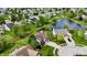 Beautiful aerial view of home with a well maintained yard and a view of the pond at 861 Stardust Ct, Franklin, IN 46131