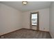 Simple bedroom with carpeted floor and window at 861 Stardust Ct, Franklin, IN 46131