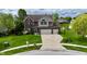 Charming exterior of a two-story home featuring a spacious driveway and well-manicured lawn at 861 Stardust Ct, Franklin, IN 46131