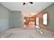 Gathering room with view of kitchen and access to back patio at 861 Stardust Ct, Franklin, IN 46131
