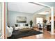 Bright and airy living room with stylish furniture and a view of the dining area at 861 Stardust Ct, Franklin, IN 46131