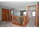 Upstairs hallway with carpet and doors to bedrooms at 861 Stardust Ct, Franklin, IN 46131