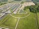 Aerial view of a new residential community with houses, ponds, and walking paths at 8703 Duncan St, Fortville, IN 46040