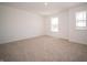 Bright bedroom featuring two windows with views, creating a peaceful and inviting retreat at 8703 Duncan St, Fortville, IN 46040