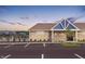 Community center with a brick exterior, manicured landscaping, and ample parking at 8703 Duncan St, Fortville, IN 46040