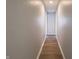 Long hallway with wood-look floors at 935 S Morgantown Rd, Greenwood, IN 46143