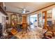 Bright dining room features a round table, wooden chairs, and built-in hutch at 11614 Peacock Dr, Indianapolis, IN 46236