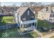 Modern home with gray siding, a balcony, and a landscaped yard at 1948 Central Ave, Indianapolis, IN 46202