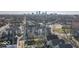 Aerial view of neighborhood with cityscape in background at 1948 Central Ave, Indianapolis, IN 46202