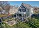 Luxury home with backyard patio, firepit, and screened porch at 1948 Central Ave, Indianapolis, IN 46202