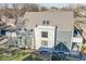 Aerial view highlighting home's rear elevation and landscaping at 1948 Central Ave, Indianapolis, IN 46202