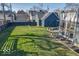 Large backyard with grassy area and patio at 1948 Central Ave, Indianapolis, IN 46202