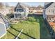 Spacious backyard with large grassy area and modern deck at 1948 Central Ave, Indianapolis, IN 46202