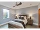 Cozy bedroom with wood furniture and soft lighting at 1948 Central Ave, Indianapolis, IN 46202