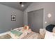 Cozy bedroom with a low bed and plenty of natural light at 1948 Central Ave, Indianapolis, IN 46202