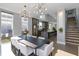 Open concept dining room with kitchen and staircase views at 1948 Central Ave, Indianapolis, IN 46202