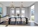 Spacious dining area with large windows and modern light fixtures at 1948 Central Ave, Indianapolis, IN 46202