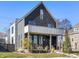 Modern two-story home with dark siding and a light gray accent at 1948 Central Ave, Indianapolis, IN 46202