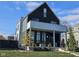 Modern two-story home with black and gray exterior and landscaped yard at 1948 Central Ave, Indianapolis, IN 46202