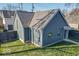 Gray house with modern design and small yard at 1948 Central Ave, Indianapolis, IN 46202