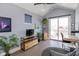 Bright home office with built-ins, balcony access, and hardwood floors at 1948 Central Ave, Indianapolis, IN 46202