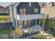 Modern home exterior with balcony and landscaping at 1948 Central Ave, Indianapolis, IN 46202