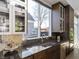 Modern kitchen with stainless steel appliances and granite countertops at 1948 Central Ave, Indianapolis, IN 46202