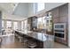 Spacious kitchen boasts modern cabinetry, large island, and high-end appliances at 1948 Central Ave, Indianapolis, IN 46202