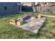 Modern patio with firepit and seating area at 1948 Central Ave, Indianapolis, IN 46202