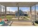 Screened porch overlooking backyard patio and firepit at 1948 Central Ave, Indianapolis, IN 46202