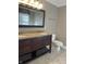 Bathroom features granite double vanity and decorative dark wood cabinetry at 2207 Glebe St, Carmel, IN 46032