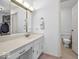 Bathroom featuring a vanity with large mirror and access to the toilet at 2224 Boston Ct # A, Indianapolis, IN 46228