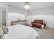 Spacious bedroom featuring neutral tones, a chandelier, and decorative accents at 2224 Boston Ct # A, Indianapolis, IN 46228