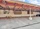 Carport area with wall storage, with a bicycle hanging on the wall at 2224 Boston Ct # A, Indianapolis, IN 46228