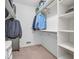 Walk in closet with built in shelving and hanging racks at 2224 Boston Ct # A, Indianapolis, IN 46228