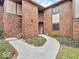 Brick exterior with a walkway to an apartment building's entrance at 2224 Boston Ct # A, Indianapolis, IN 46228