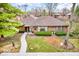 A inviting home exterior with lush landscaping and a winding pathway at 2224 Boston Ct # A, Indianapolis, IN 46228