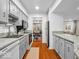 Contemporary kitchen with gray cabinetry, granite counters, and stainless steel appliances at 2224 Boston Ct # A, Indianapolis, IN 46228
