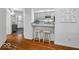 Bright kitchen featuring gray cabinets, granite countertops, and bar stool seating at 2224 Boston Ct # A, Indianapolis, IN 46228