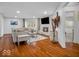 Bright living room with hardwood floors, fireplace, and contemporary decor at 2224 Boston Ct # A, Indianapolis, IN 46228